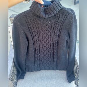 Black turtle neck sweater